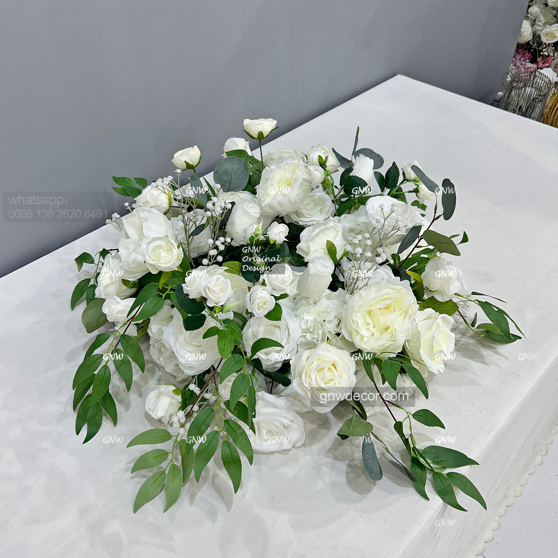 Artificial flower wreath