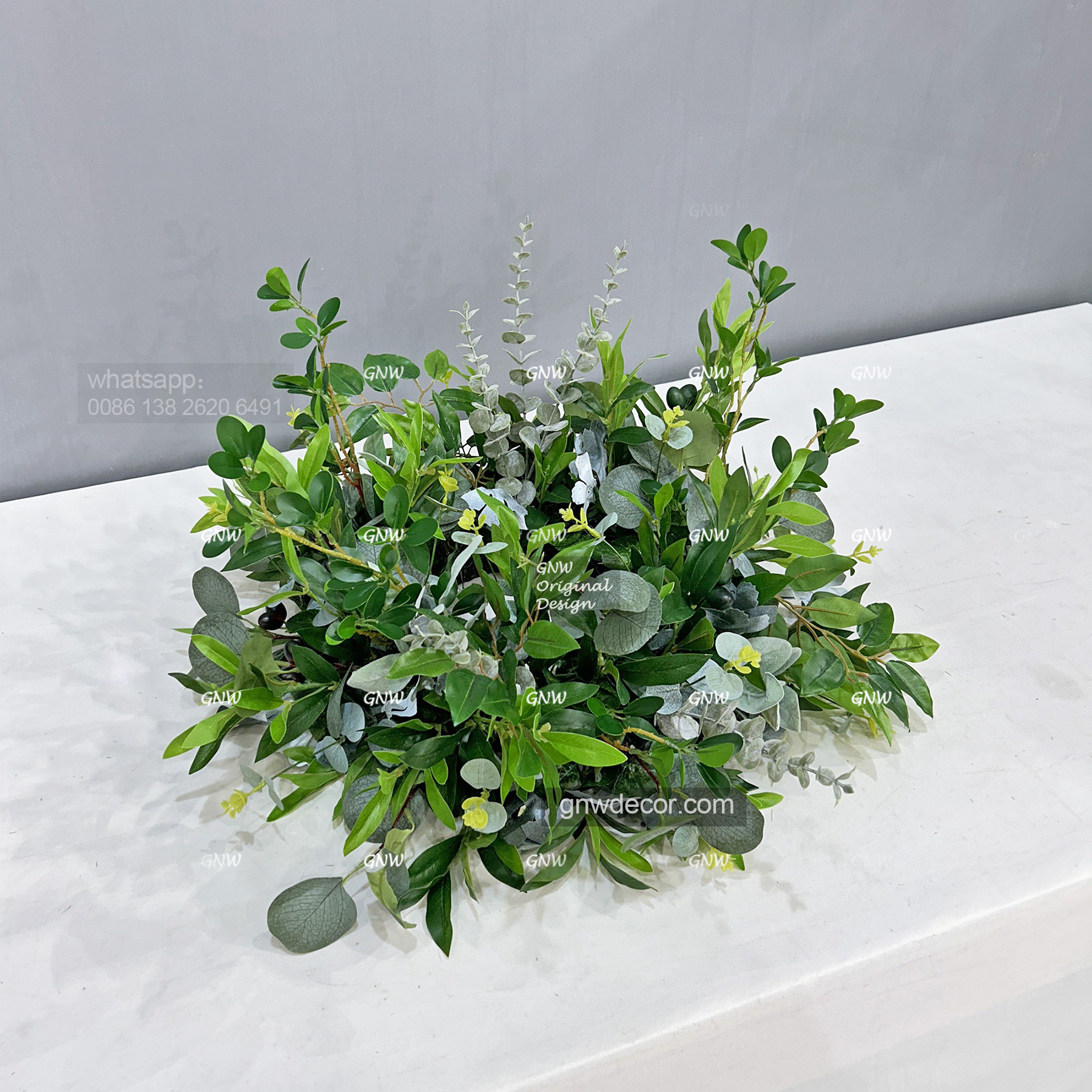 Artificial flower wreath