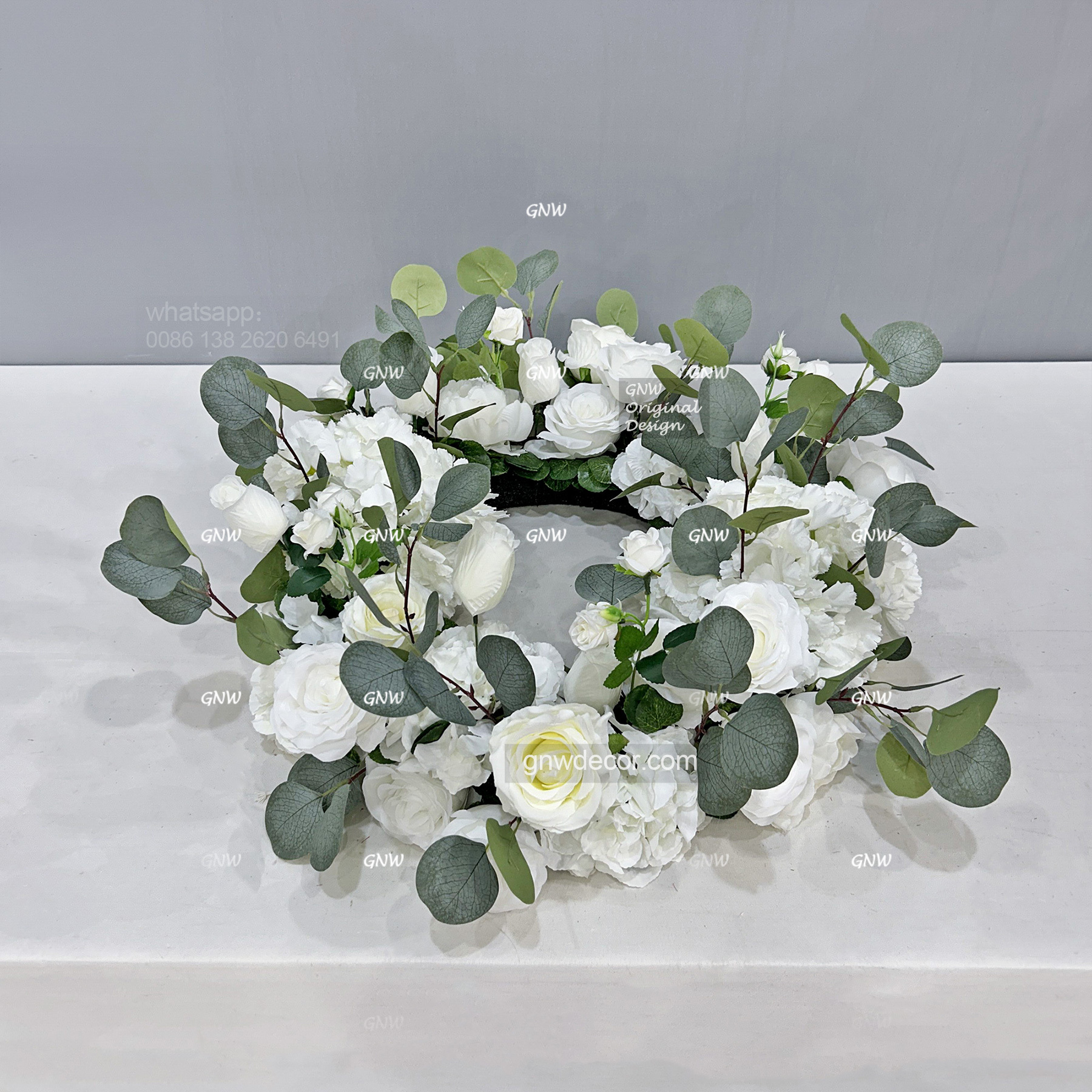 Artificial flower wreath