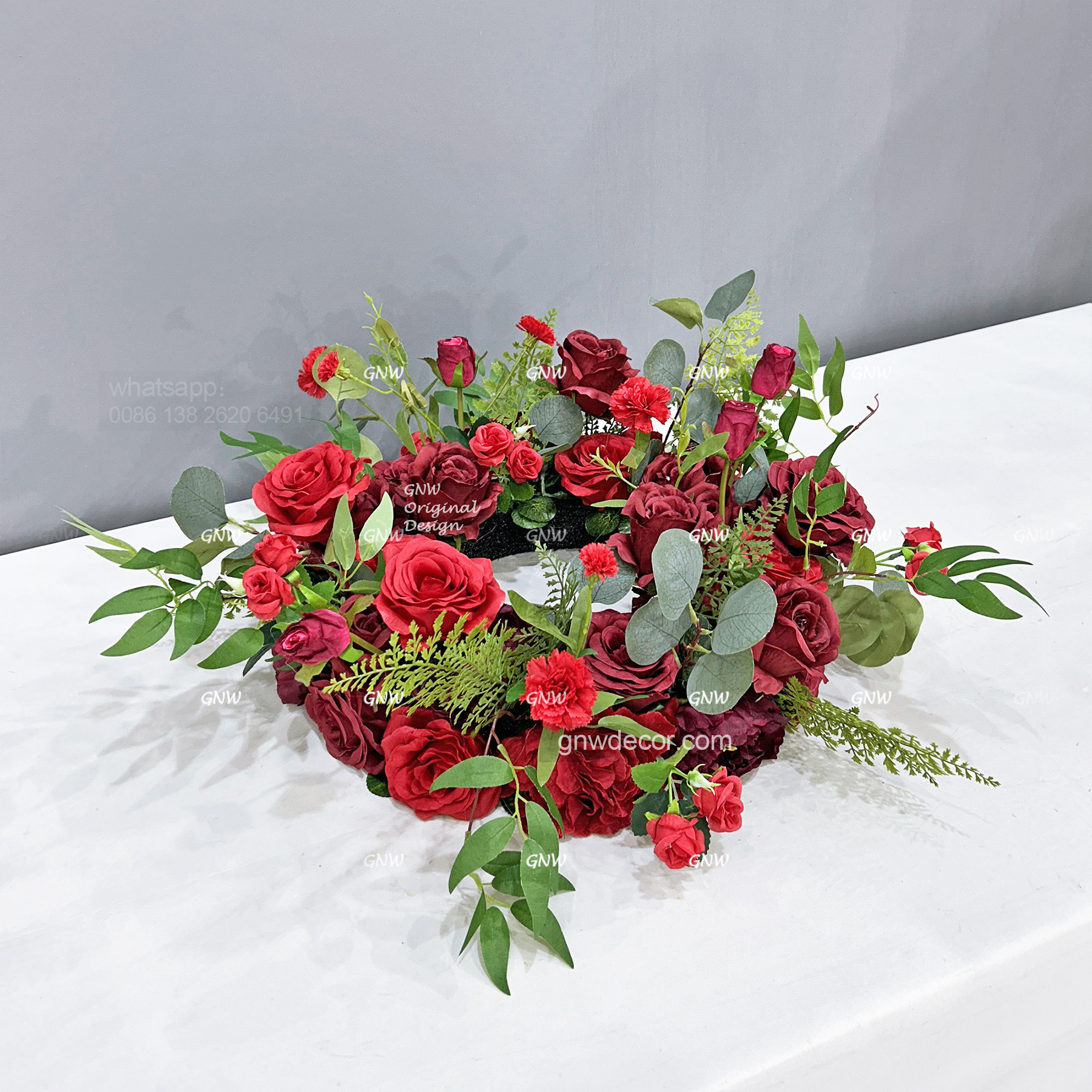 Artificial flower wreath