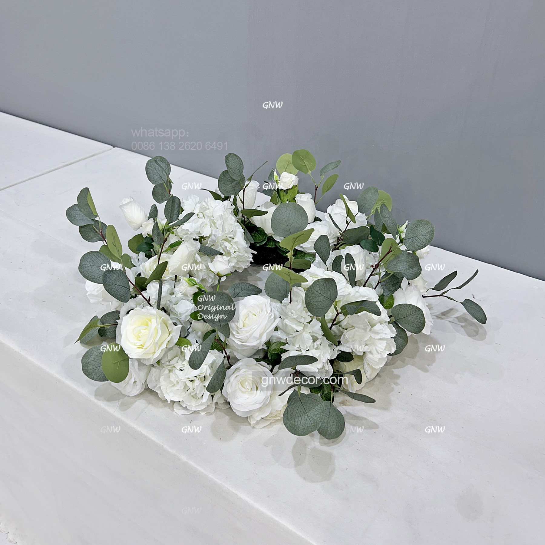 Artificial flower wreath