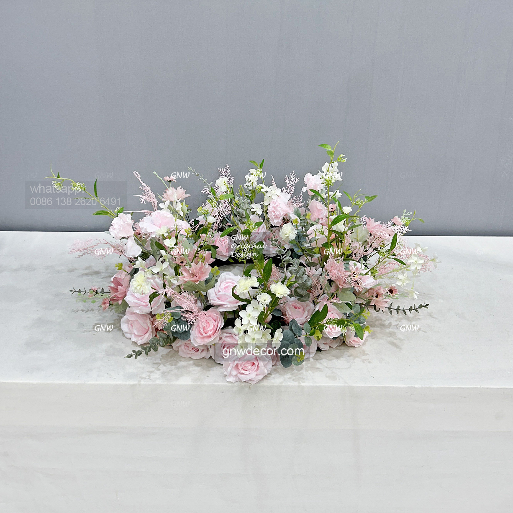 Artificial flower wreath