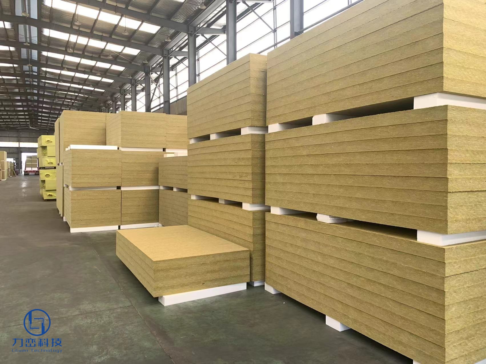 Large warehouse storage of high-density rock wool boards for slab insulation at Anhui Liluan Technology factory