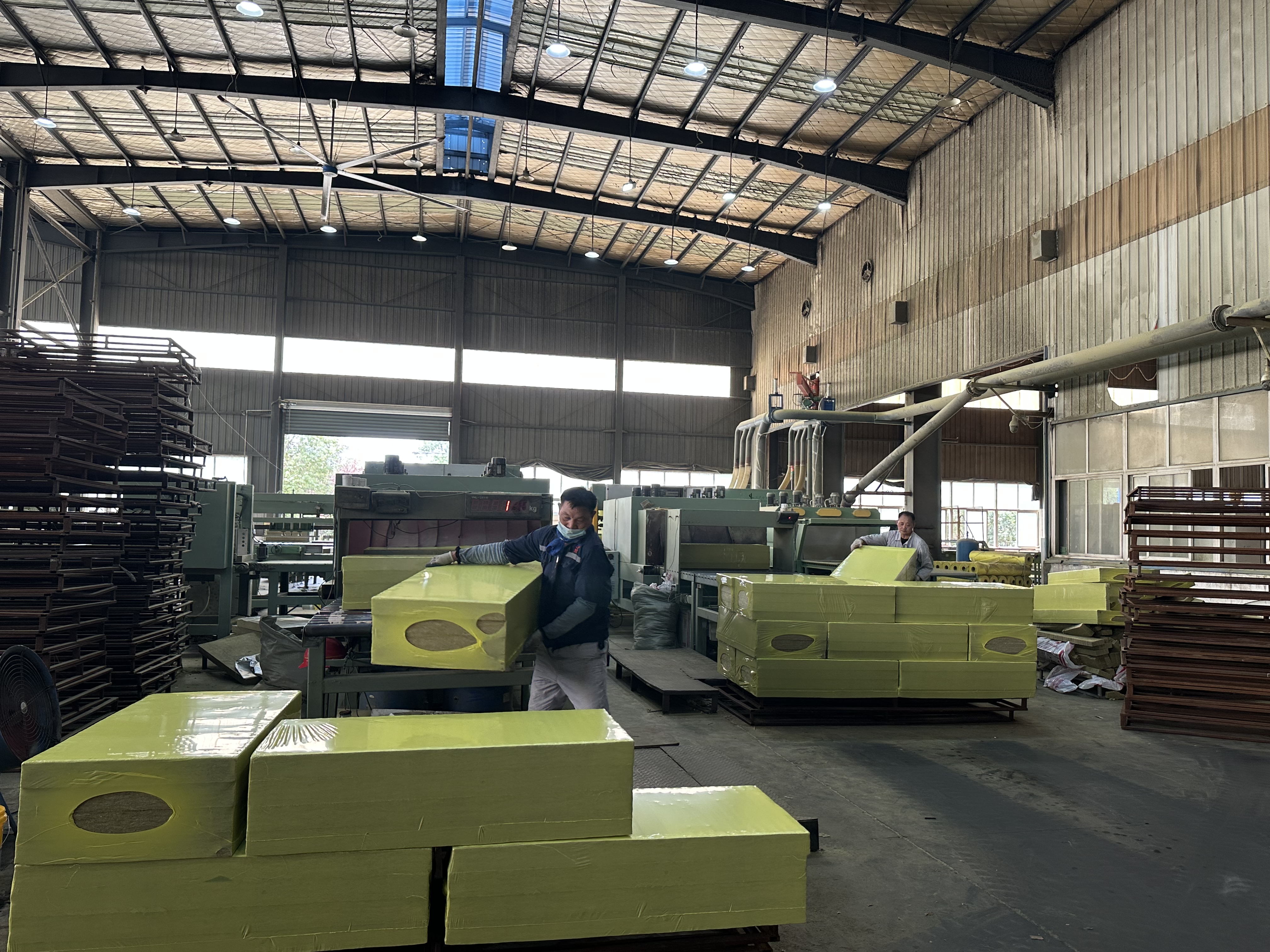 warehouse production line workers rock wool board with yellow films-LiLuan Technology