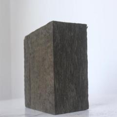 Black fireproof rock wool board single block side view showing thickness and dense fiber texture - A1 fire-rated acoustic insulation by Liluan Technology