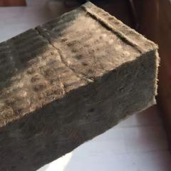 Close-up of black rock wool board cut surface showing fiber structure for fireproof and sound absorption applications-LiLuan Technology