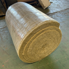 Close-up of bare rock wool blanket roll showing dense honeycomb fiber texture and thickness - high-temperature industrial insulation material by Liluan Technology