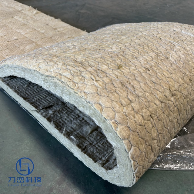 Close-up of rock wool roll blanket with wire mesh reinforcement showing dense fiber and hexagonal mesh structure - high-strength industrial insulation by Liluan Technology