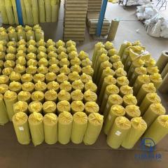 Large warehouse storage of pre-packaged rock wool pipe sections ready for steam piping insulation projects - Liluan Technology