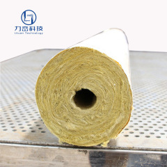 Close-up cross-section of rock wool pipe with foil showing dense fiber core and aluminum foil layer - industrial piping insulation detail by Liluan Technology
