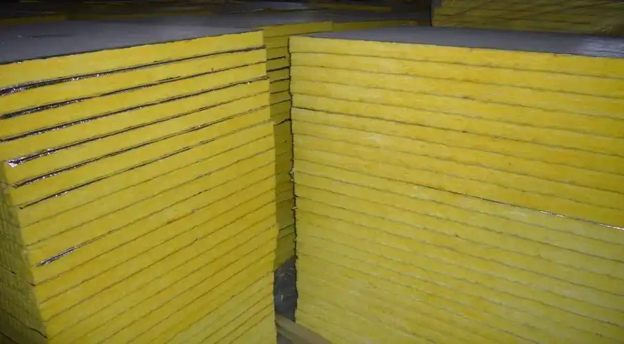 Large stacks of glass wool boards with aluminum foil– lightweight thermal and acoustic insulation material ready for construction by Liluan Technology
