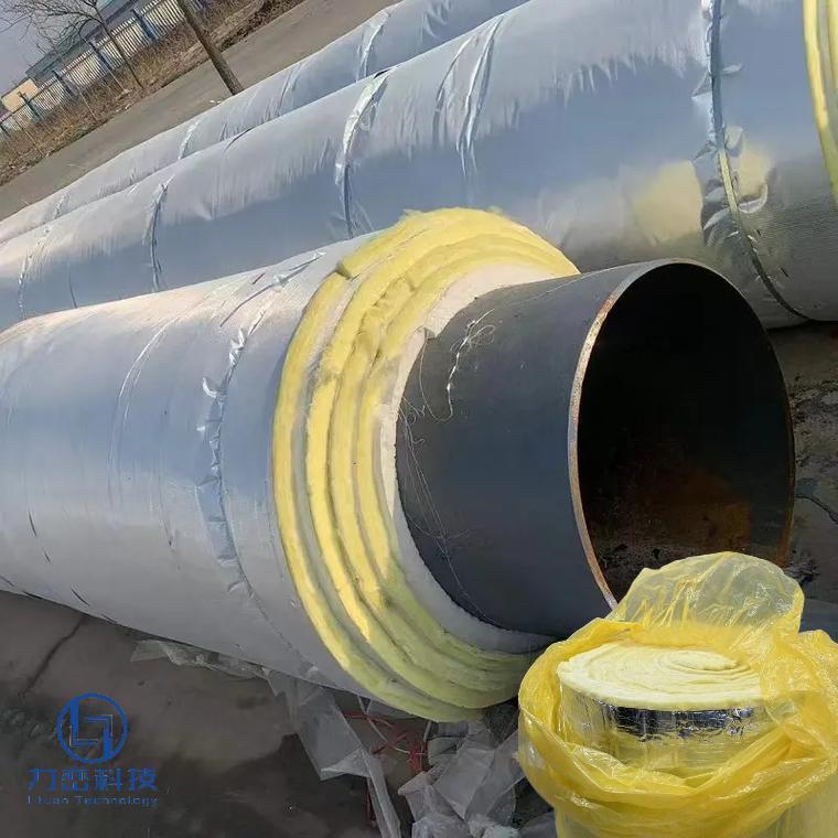 Glass wool blanket flexibly wrapped on large industrial pipes with aluminum foil jacket – flexible thermal & acoustic insulation by Liluan Technology