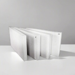 Four aluminum silicate boards standing upright – high-temperature insulation panels with clean white surface by Liluan Technology