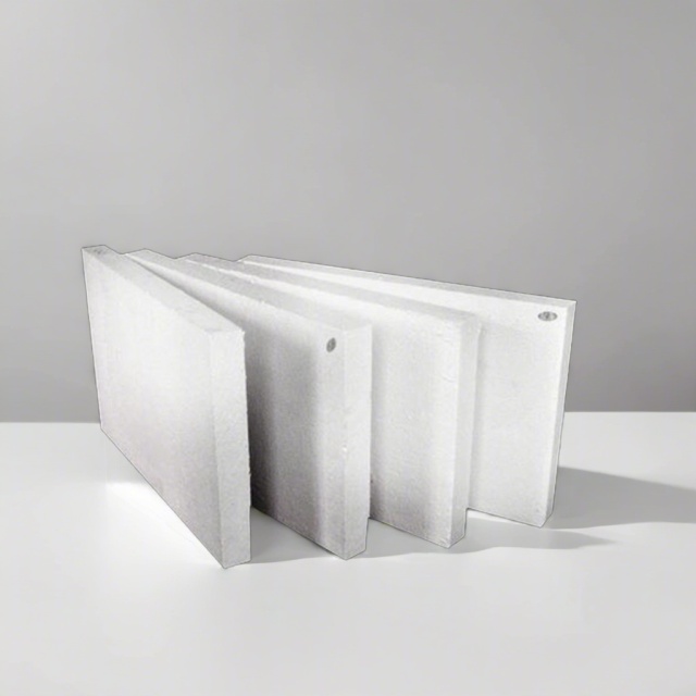 Four aluminum silicate boards standing upright – high-temperature insulation panels with clean white surface by Liluan Technology