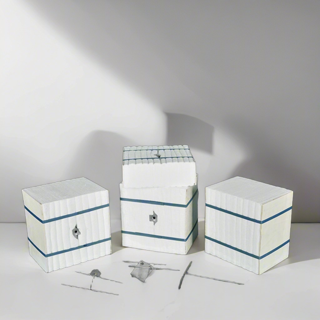 Aluminum silicate modules in cube form with metal anchoring pins – preformed high-temperature insulation modules ready for installation by Liluan Technology