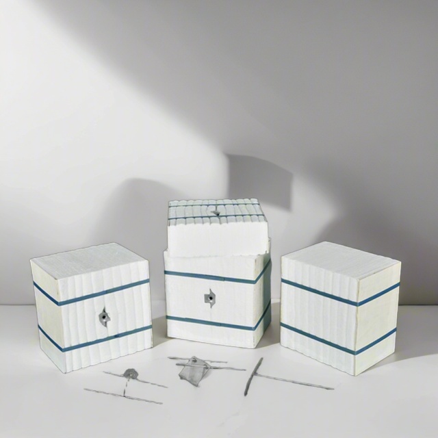 Aluminum silicate modules in cube form with metal anchoring pins – preformed high-temperature insulation modules ready for installation by Liluan Technology