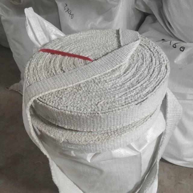 Rolled ceramic fiber textile tape secured with red strap – flexible high-temperature insulation fabric by Liluan Technology