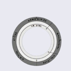 A studio product photograph against a clean white background, showcasing multiple stacks of Liluan spiral wound gaskets. The distinct yellow and green colored outer rings represent different stainless steel grades (SS304/SS316L), highlighting the color-coding system for easy on-site material identification of multi-ring gasket designs-LiLuan Technology