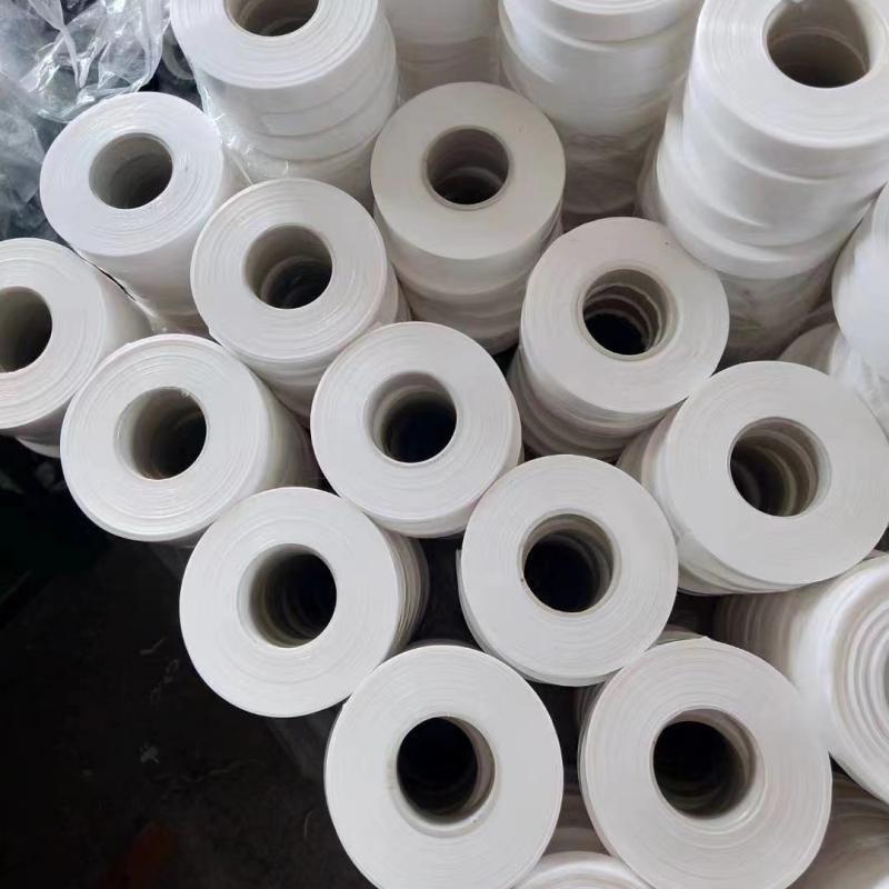 Bulk stock of expanded PTFE (EPTFE) sealing tape rolls, flexible corrosion-resistant PTFE sealing material for custom gasket making, on-site sealing and pipeline flange applications-LiLuan Technology
