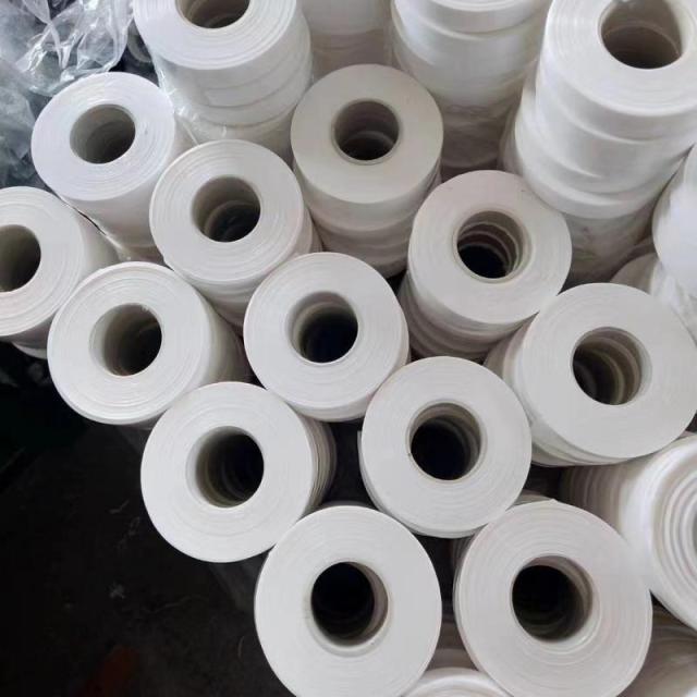 Bulk stock of expanded PTFE (EPTFE) sealing tape rolls, flexible corrosion-resistant PTFE sealing material for custom gasket making, on-site sealing and pipeline flange applications-LiLuan Technology