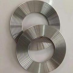 Close-up view of stainless steel corrugated (serrated) metal gasket with precision-machined concentric serrations, reliable high pressure flange sealing gasket.-LiLuan Technology
