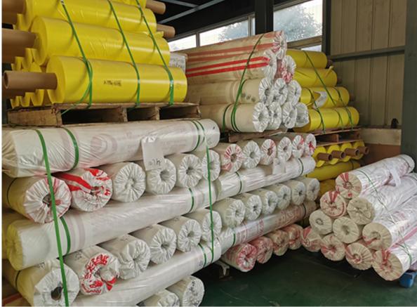 Bulk packaged PE heat shrink film rolls in factory, polyethylene shrink wrap for industrial packaging and logistics protection, with outer protective packaging for transportation-LiLuan Technology