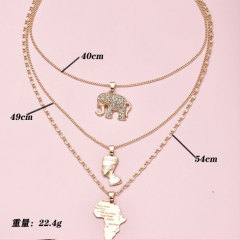 2021 new fashion gold plated layered necklace irregular map and people head alloy necklace jewelry for women and girls