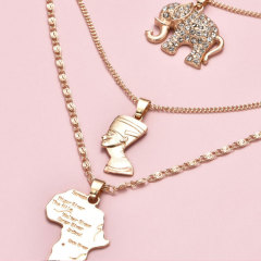 2021 new fashion gold plated layered necklace irregular map and people head alloy necklace jewelry for women and girls