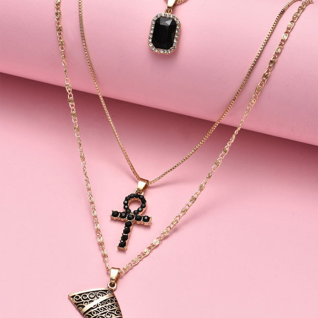 2021 hot sale gold plated layered black rhinestone necklace irregular map and people head alloy necklace jewelry for women and girls