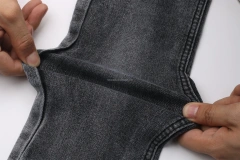 China Wholesale Best Quality Low Price Soft Nice Slubby 10oz 67'' Super High Stretch Black Black Denim Jeans Fabric