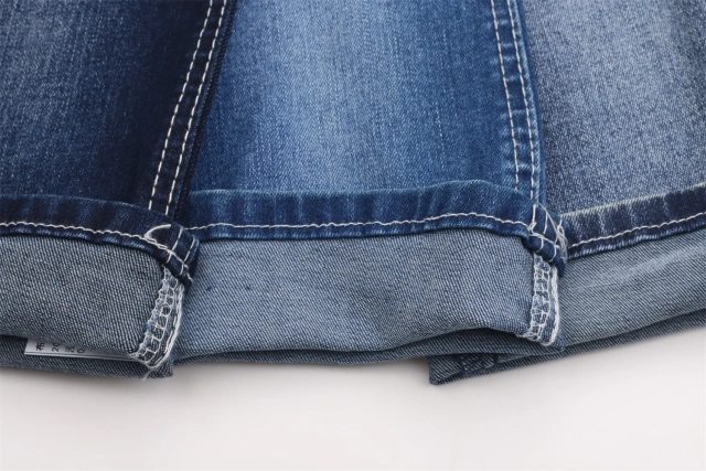 Chinese Factory Hot Sale High Elastic Dark Blue 9.2OZ Warp Slub Cotton/Poly/Spandex TR Denim Fabric for Jeans