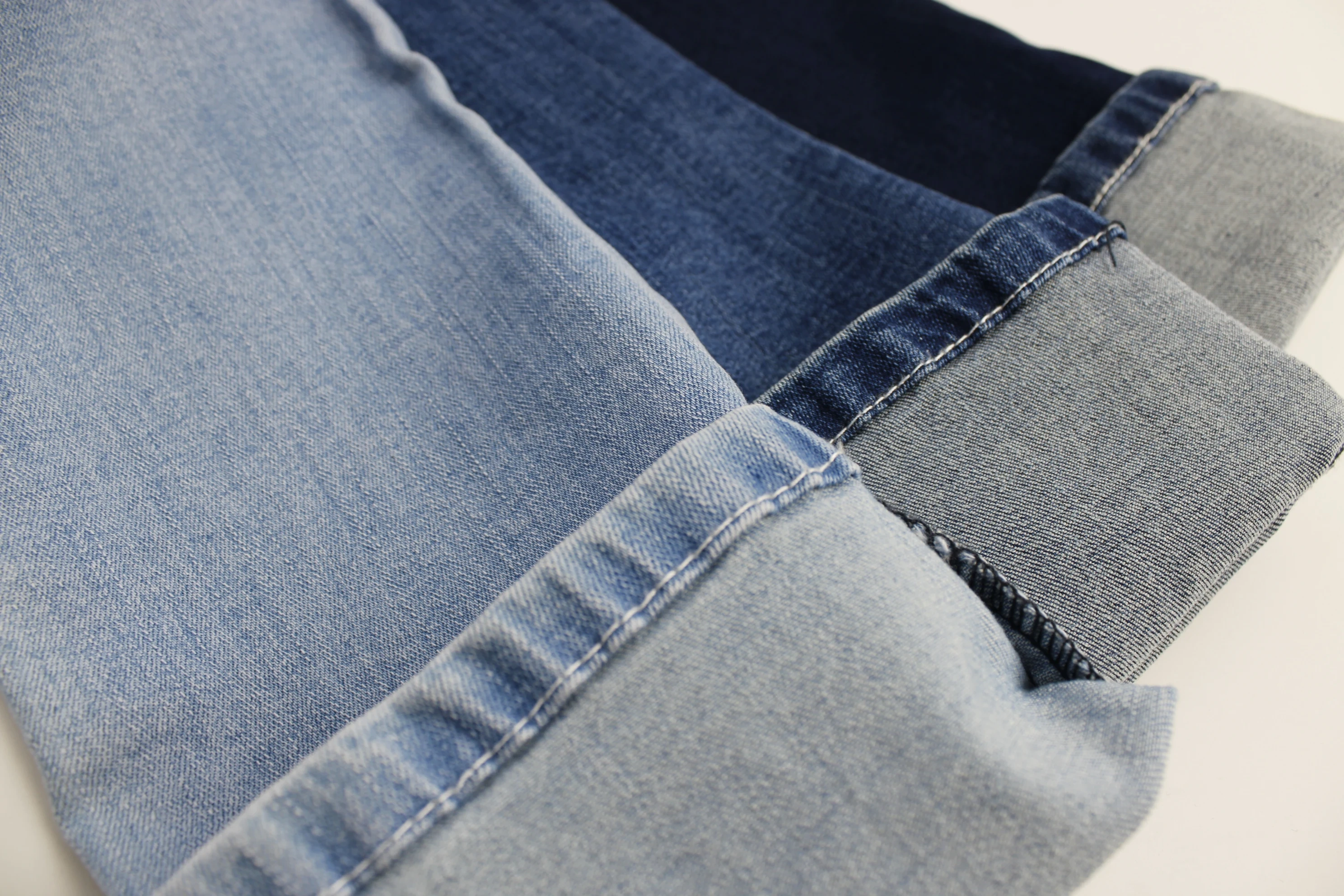 Chinese Factory Hot Sale High Elastic Dark Blue 10 OZ Warp Slub Cotton/Poly/Spandex OA Denim Fabric for Jeans