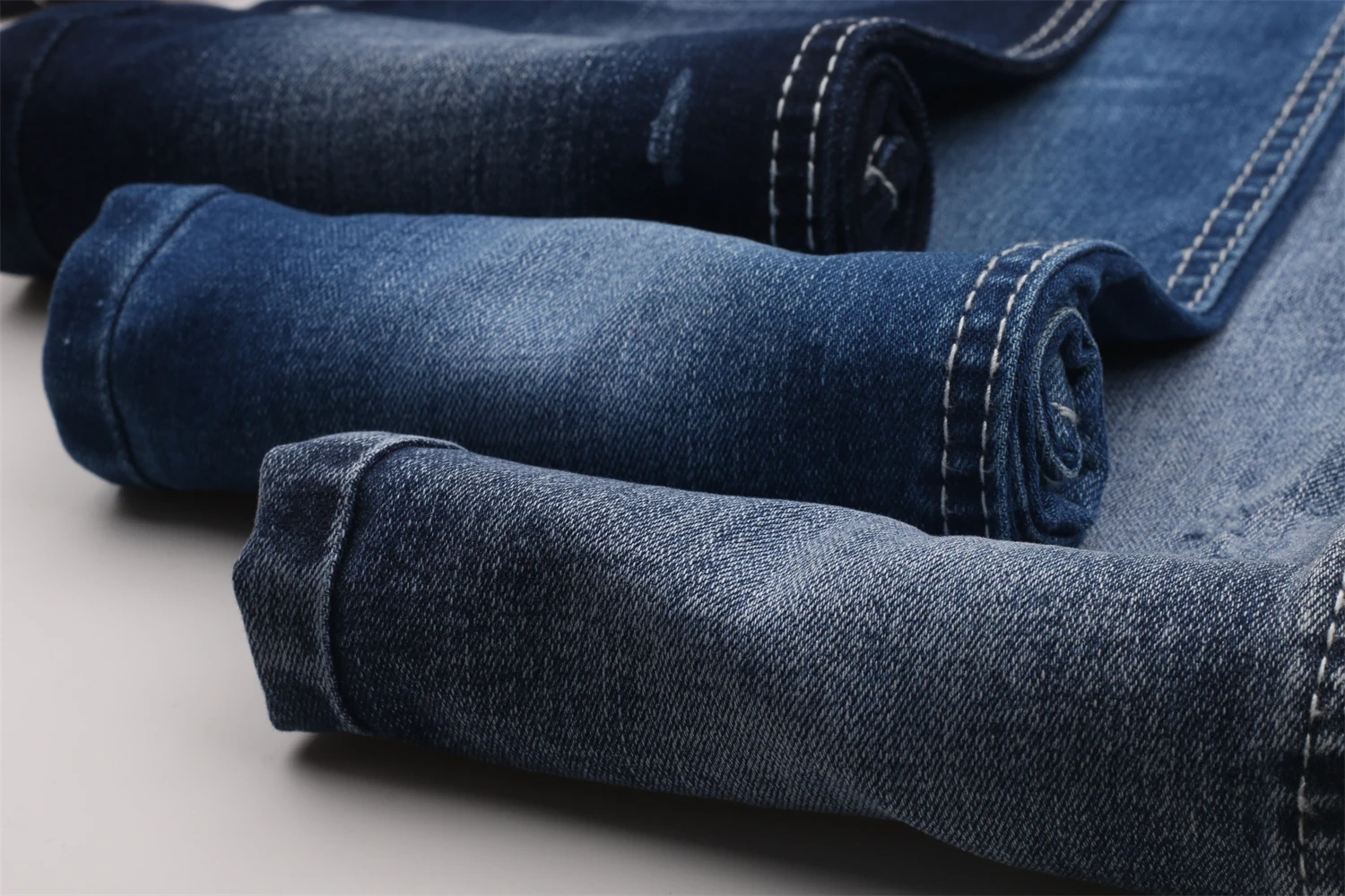 Chinese Factory Hot Sale High Elastic Dark Blue 9.2OZ Warp Slub Cotton/Poly/Spandex TR Denim Fabric for Jeans