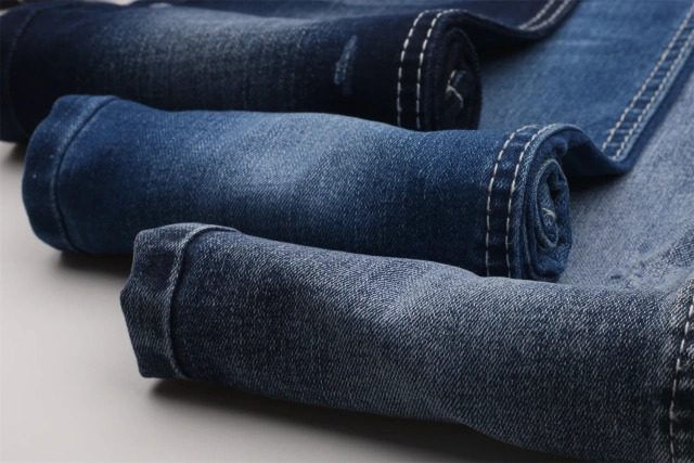 Chinese Factory Hot Sale High Elastic Dark Blue 9.2OZ Warp Slub Cotton/Poly/Spandex TR Denim Fabric for Jeans