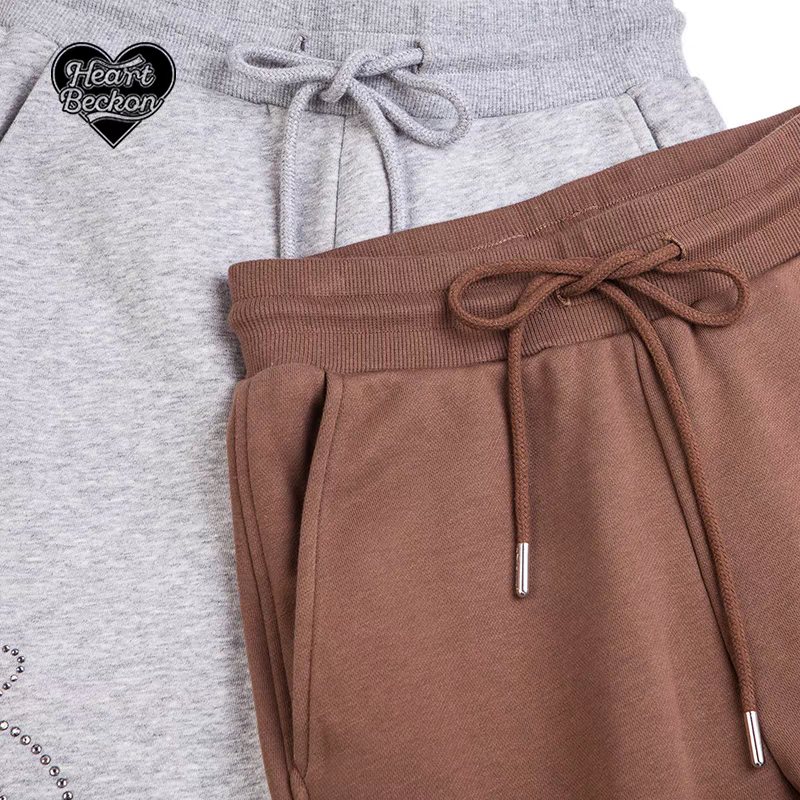 Heart Beckon joint silk jogging pants 603061