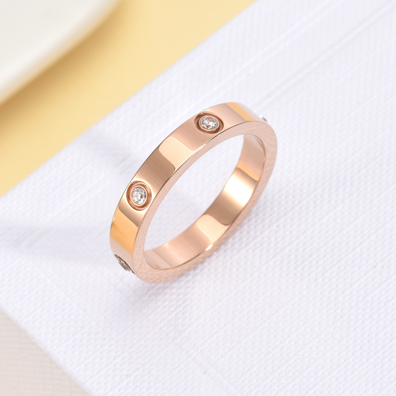 Anillo de acero inoxidable con incrustaciones de diamantes de estilo moderno, anillo de pareja de alta gama y que no se decolora, anillo de diamantes de seis diamantes de 5.5 mm  ACRSS/05-33