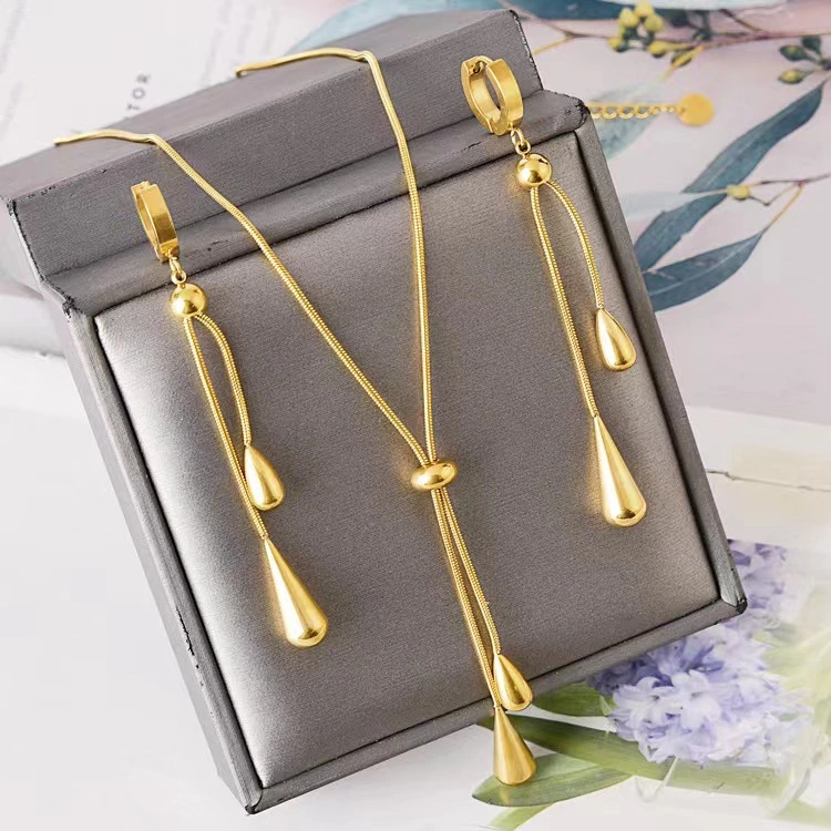 Conjunto de pendientes y collar con forma de gota de agua con borla ajustable, cadena redonda de hueso de serpiente que no se decolora, venta al por mayor  ACRSS/26-73