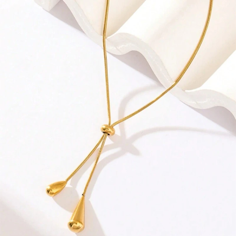 Conjunto de pendientes y collar con forma de gota de agua con borla ajustable, cadena redonda de hueso de serpiente que no se decolora, venta al por mayor  ACRSS/26-73
