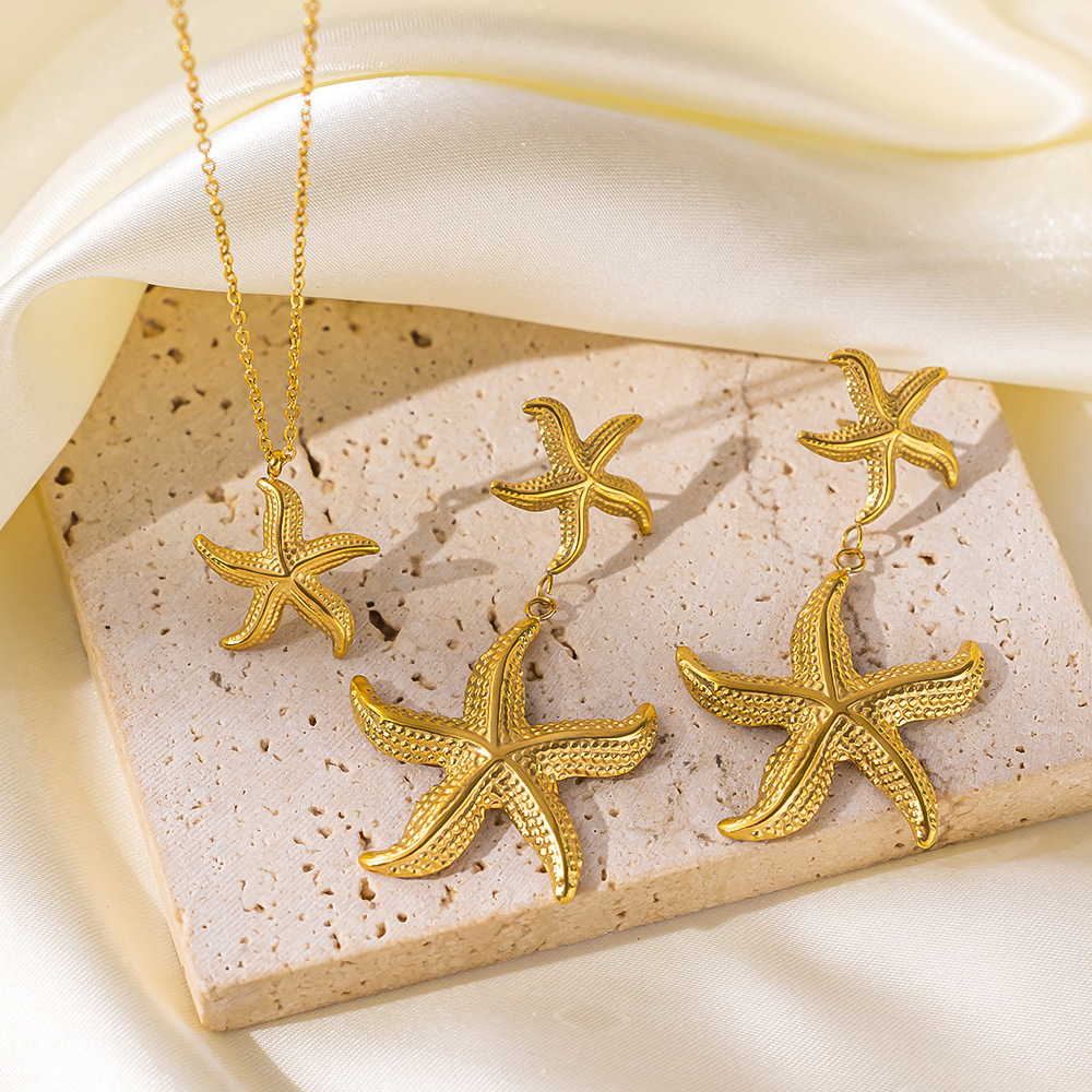 Estilo de vacaciones junto al mar de moda, clavícula de nicho, aretes y collar, colgante de estrella de mar, acero inoxidable, oro de 18 quilates que no se desvanece  ACRSS/27-80