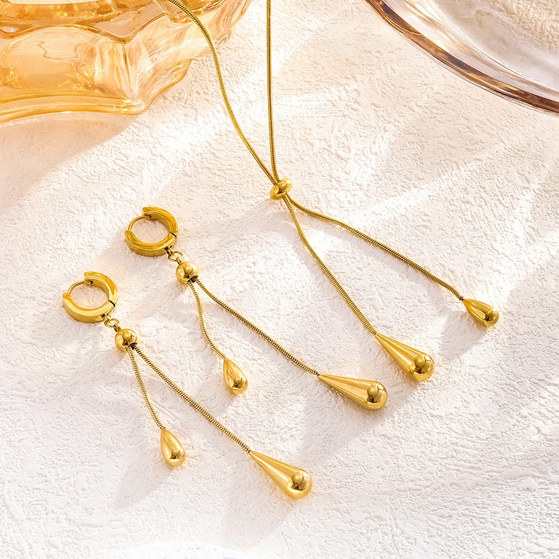 Conjunto de pendientes y collar con forma de gota de agua con borla ajustable, cadena redonda de hueso de serpiente que no se decolora, venta al por mayor  ACRSS/26-73