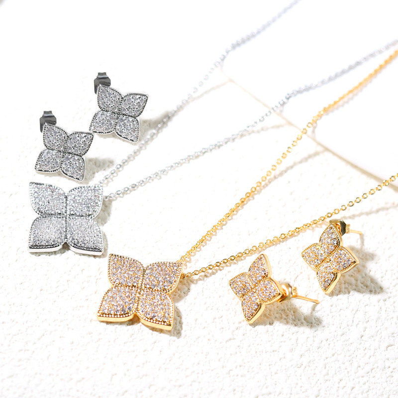 Joyas de cobre, micro engastadas con diamantes, trébol de cuatro hojas, collar y aretes, engastadas con circonitas al por mayor  COPSS/54-312