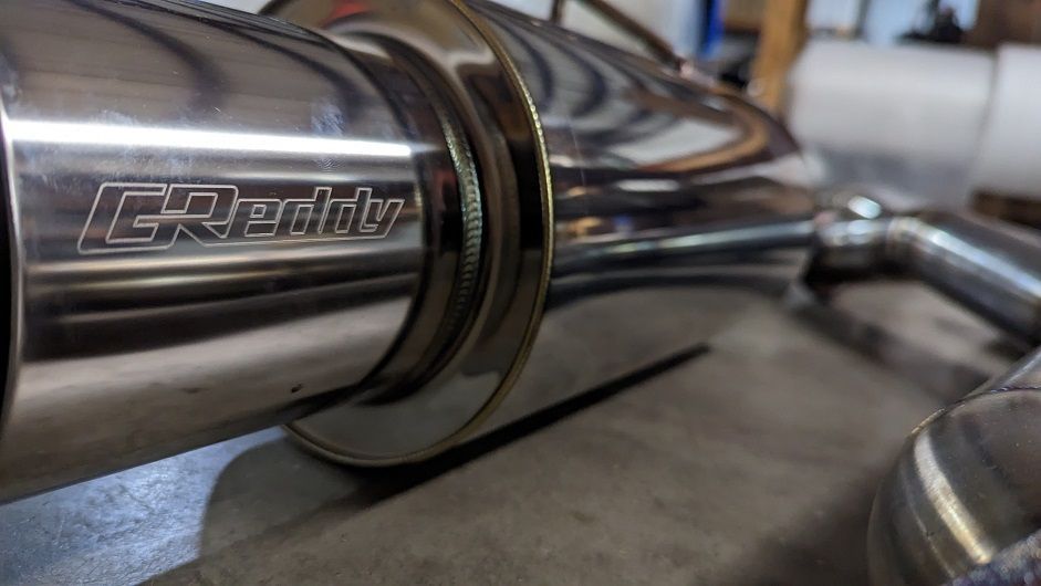 2JR Greddy Revolution Catback Exhaust for E210 Hatch – Aggressive Performance & Deep Sound