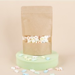 Kraft compostble pouch with rectangular window