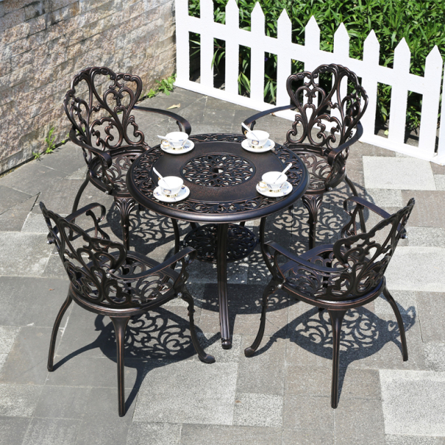 Outdoor cast aluminum tables and chairs