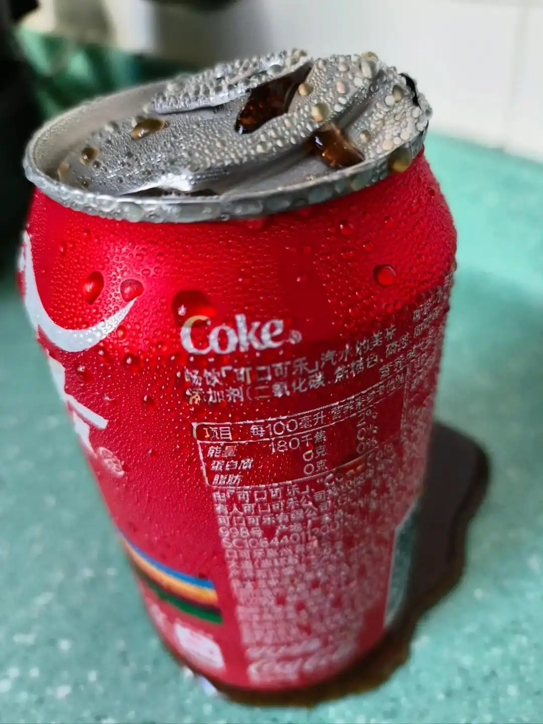 Unopened aluminum can refrigeration: safe but at a cost