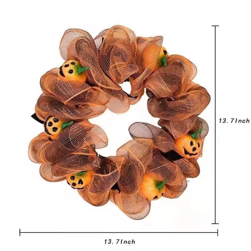 Hang a pumpkin net garland in front of your Halloween door