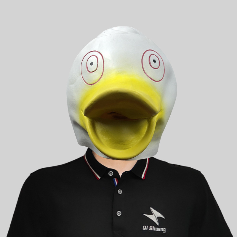 Cute little yellow duck with a big mouth and a mask