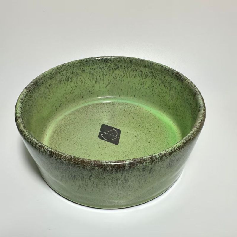 Pet-shaped purple clay pottery bowl