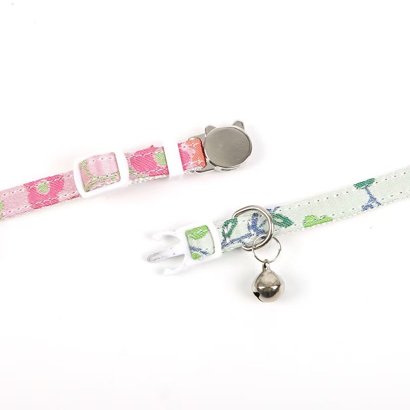 Gold-stamped bow cat collar with engraving
