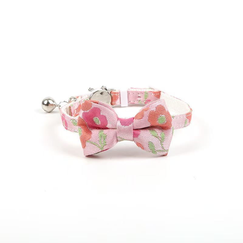Gold-stamped bow cat collar with engraving